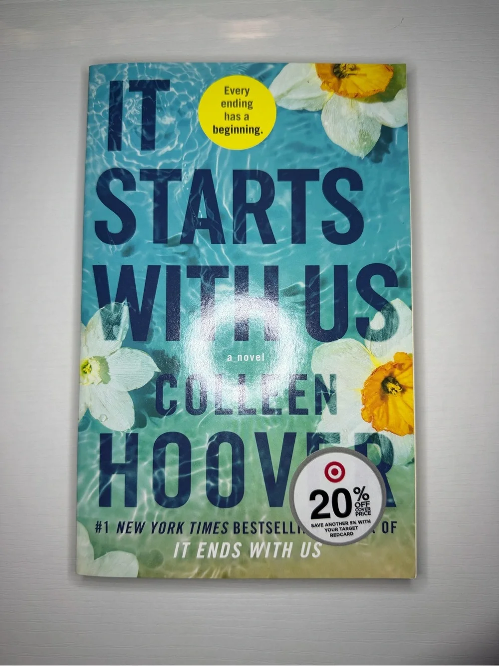 Paperback Book “It Starts With Us”
